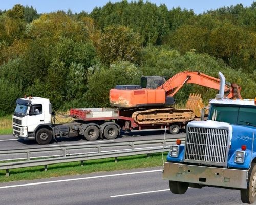 Step Deck Trucking Services | Heavy Hauling Company